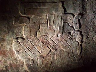 Illustration for article titled Extraordinary Carving Discovered Inside Ancient Maya Pyramid